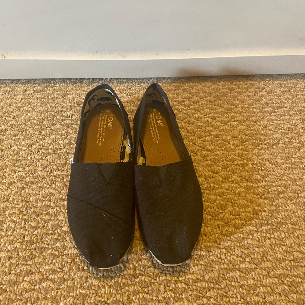 Black Toms shoes, size 8.5